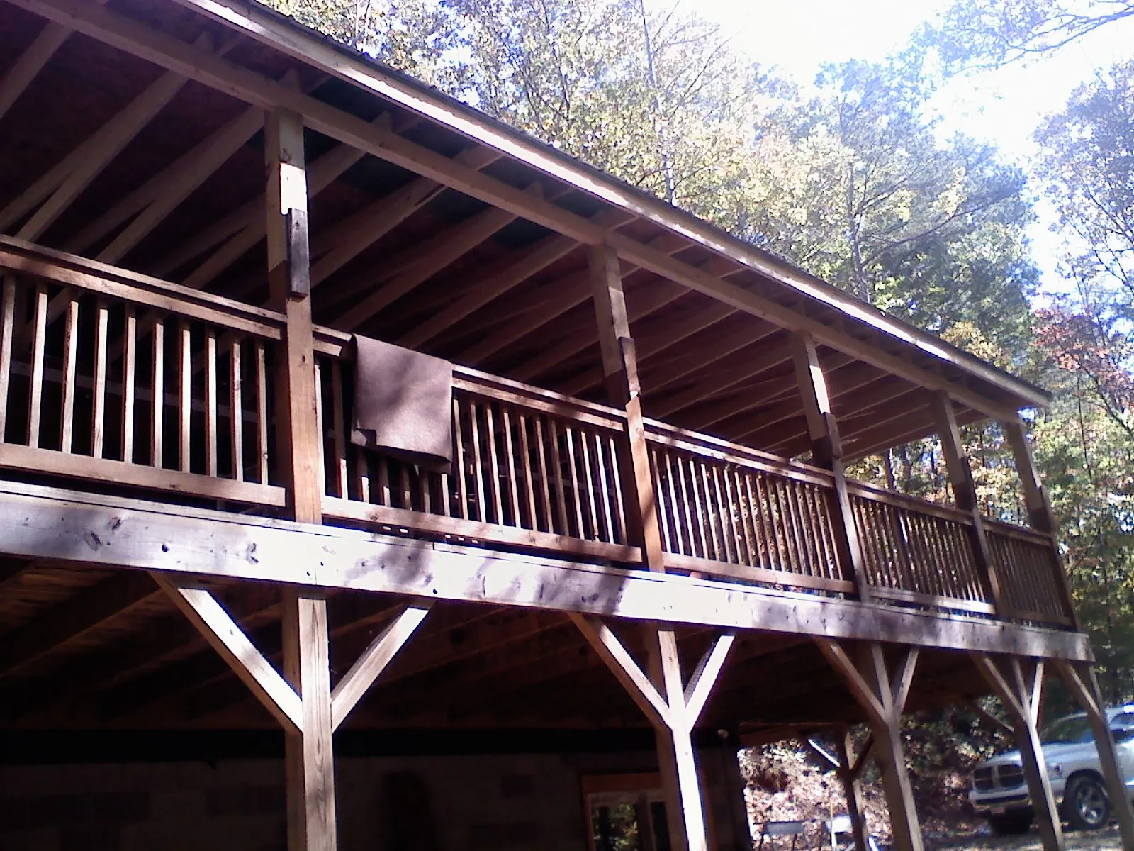 Timber framing under a new elevated porch and deck — Roof Leak Repair in Deersville by Roofing Brothers